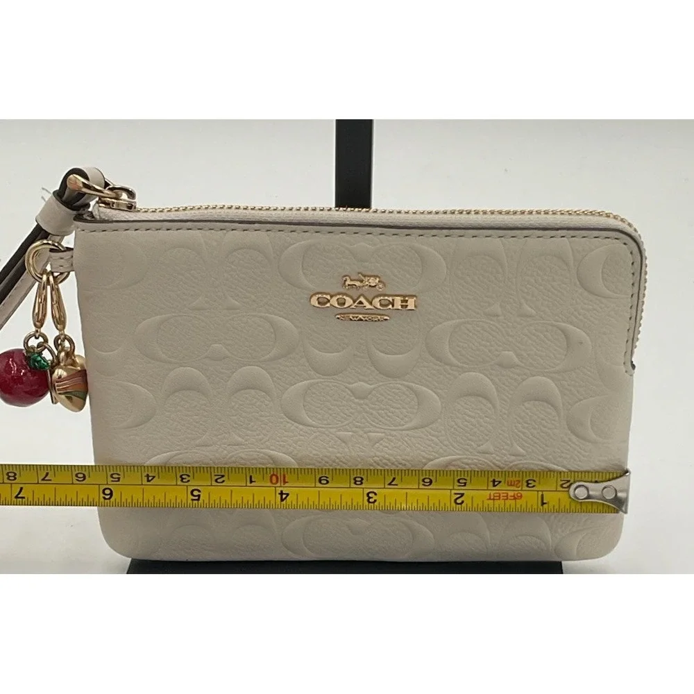 Coach Embossed Corner Zip Wristlet In Chalk With (2) Charms (see Description)
